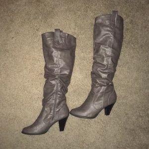 Knee high heeled boots